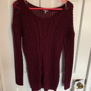 maroon sweater with holes